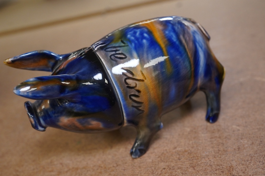 A Rye Pottery lustre glazed pig with detachable head, incised “Wunt Be Druv”, 9cm wide. Condition - fair